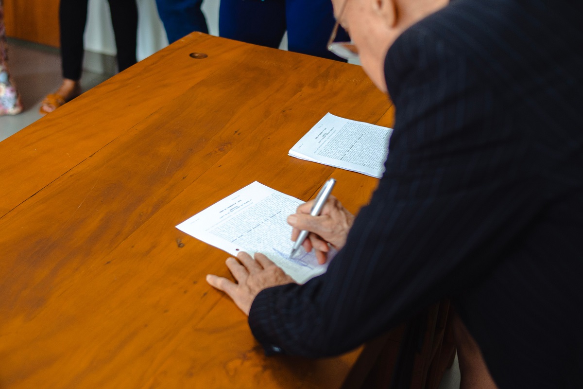 Calculator and tax papers used to compare limited company and sole trader tax